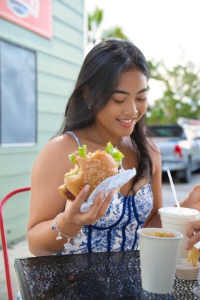  Female-eating-Burger1-20251218103356 